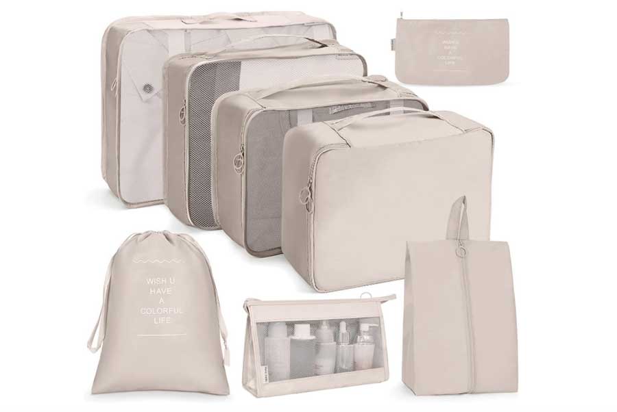 Ensemble complet d'organisateurs de valise Meowoo en coloris beige, comprenant cubes de rangement en différentes tailles, trousse de toilette transparente, sac à chaussures et pochettes zippées